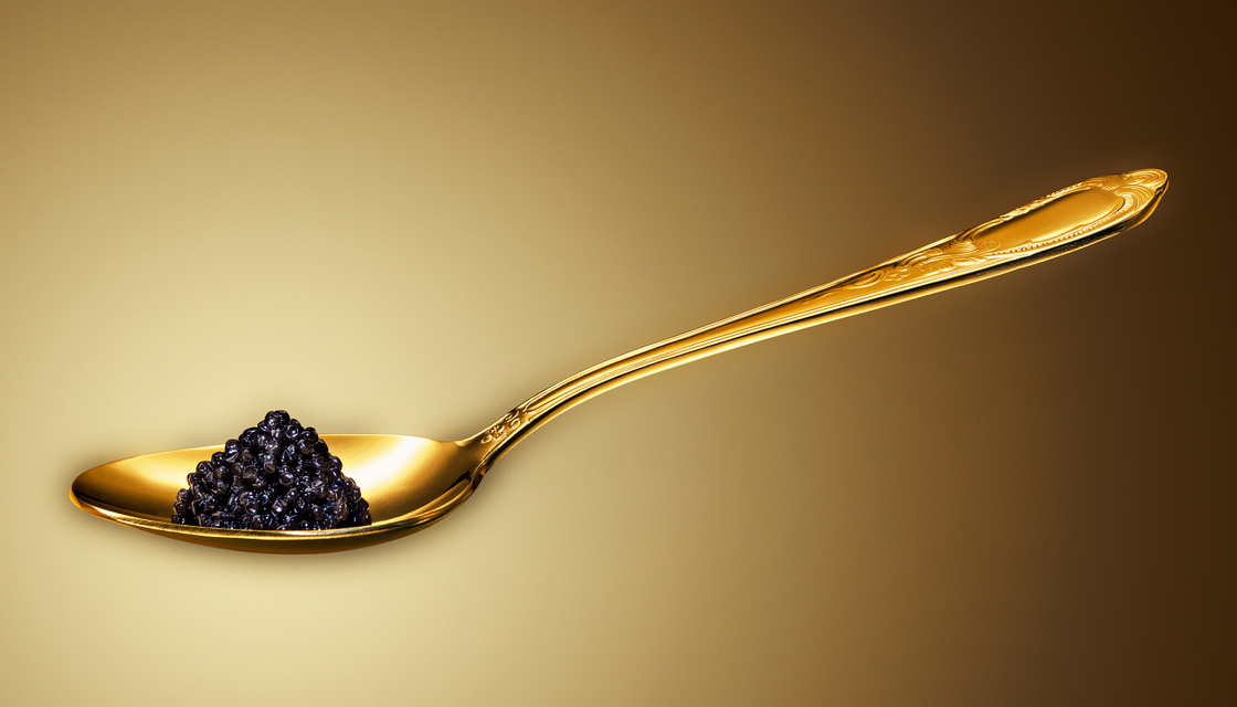 golden spoon with caviar
